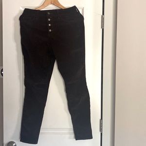 These universal thread velvet pants are a high rise button fly pant